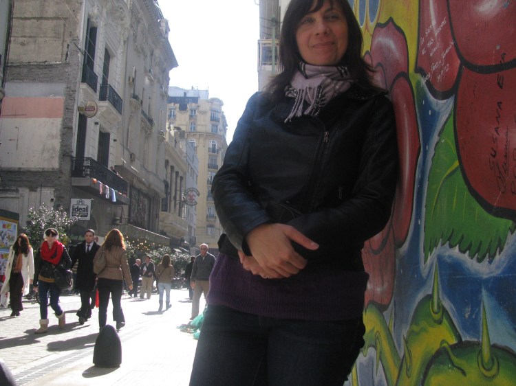 Michelle by the mural of Sandro